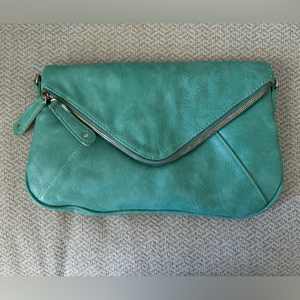 Turquoise Street Level Cluth with crossbody strap